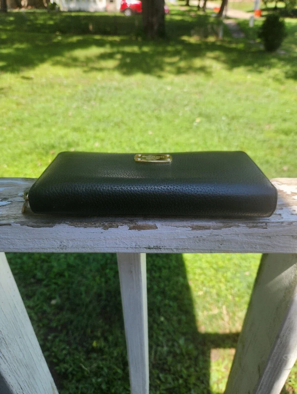 Michael Kors Jet Set Continental Wallet made of black pebbled leather EUC